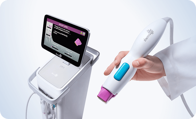 Thermage FLX device with touchscreen interface and handheld applicator in use